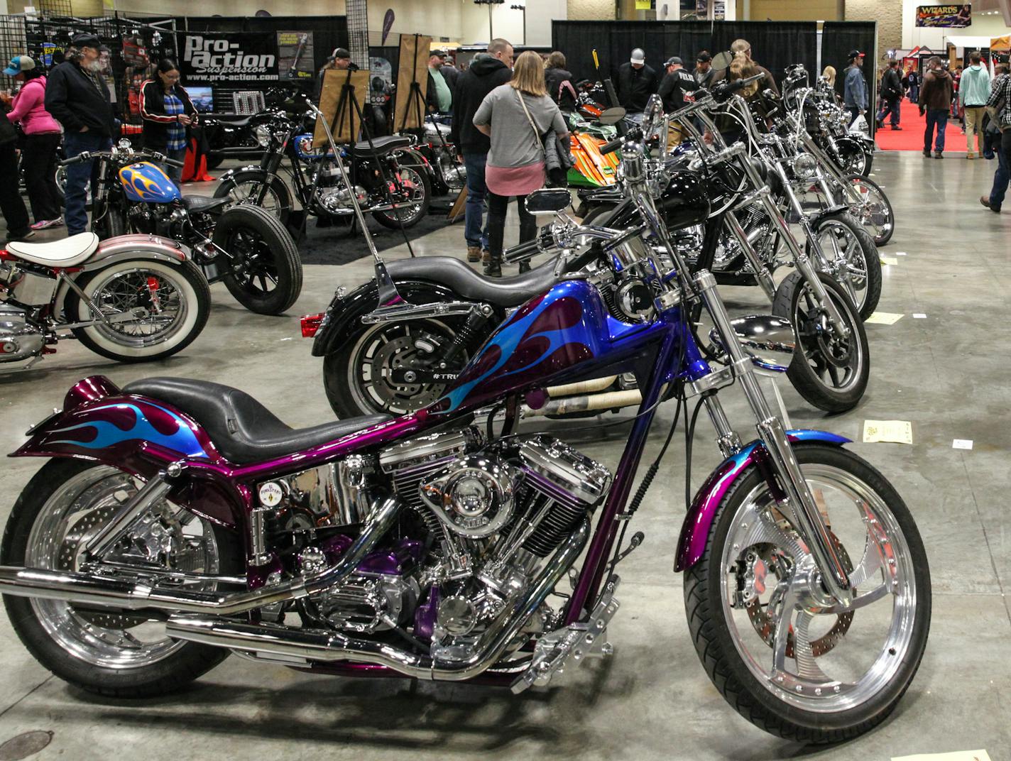 Stella Anderson, 7, points her favorite bike to her dad, Jeffrey Anderson. ] XAVIER WANG &#xa5; xavier.wang@startribune.com The 2017 Donnie Smith Bike & Car Show, which is the largest custom bike and car show in the Midwest, launches on Sunday. March 26, 2017. on the ground of the River Center in St. Paul.