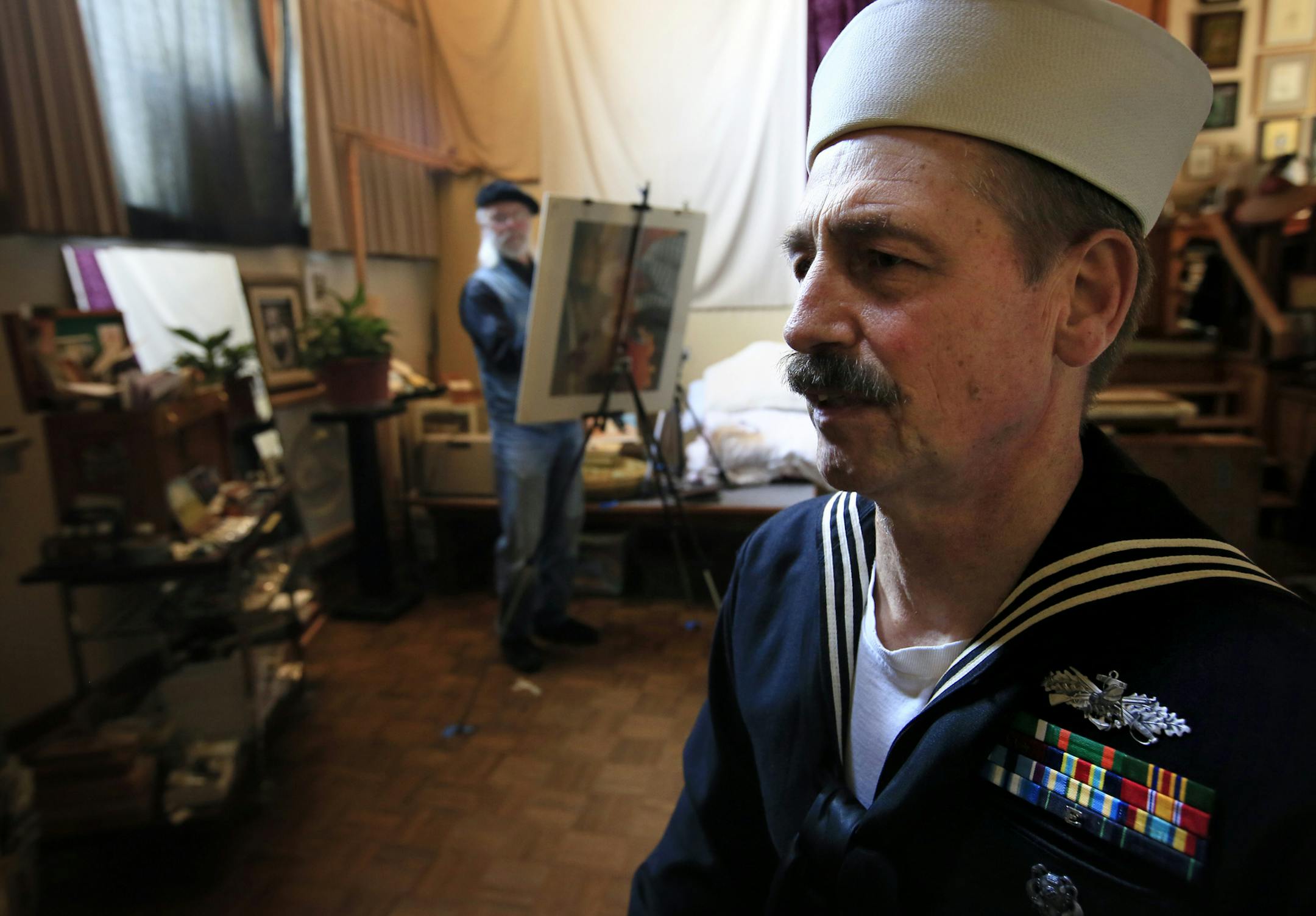 Ray Stumpf, a Navy veteran and retired school teacher is dying of cancer, he is spending his final months decked out in naval gear and sitting as the model for "the lone sailor" in one of Charles Kapsner's military paintings. ] BRIAN PETERSON &#x2022; brianp@startribune.com
Little Falls, MN - 02/27/2012