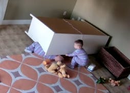 A 2-year-old Utah boy saved his twin brother pinned under a fallen dresser. The father posted surveillance video of it on Sunday, Jan. 1, 2017.