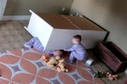 A 2-year-old Utah boy saved his twin brother pinned under a fallen dresser. The father posted surveillance video of it on Sunday, Jan. 1, 2017.