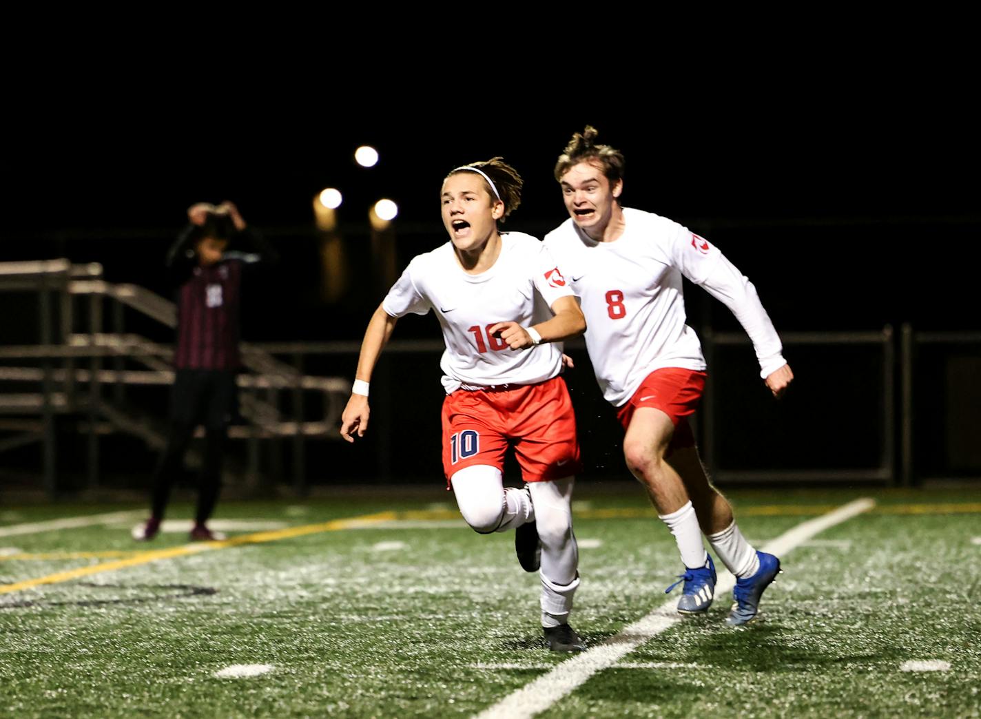 Marantha Christian Academy's Jaydon Dimitrov (10) heads to the student section to celebrate his game winning penalty kick in the final minute of play. Photo by Cheryl A. Myers, SportsEngine