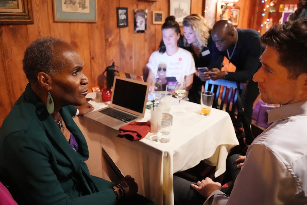 Minneapolis City Council President Andrea Jenkins, who is facing a challenge from first-time candidate Soren Stevenson, sits with Mayor Jacob Frey as they wait for election results Tuesday, Nov. 7, 2023 at The Creekside Supper Club in south Minneapolis. 