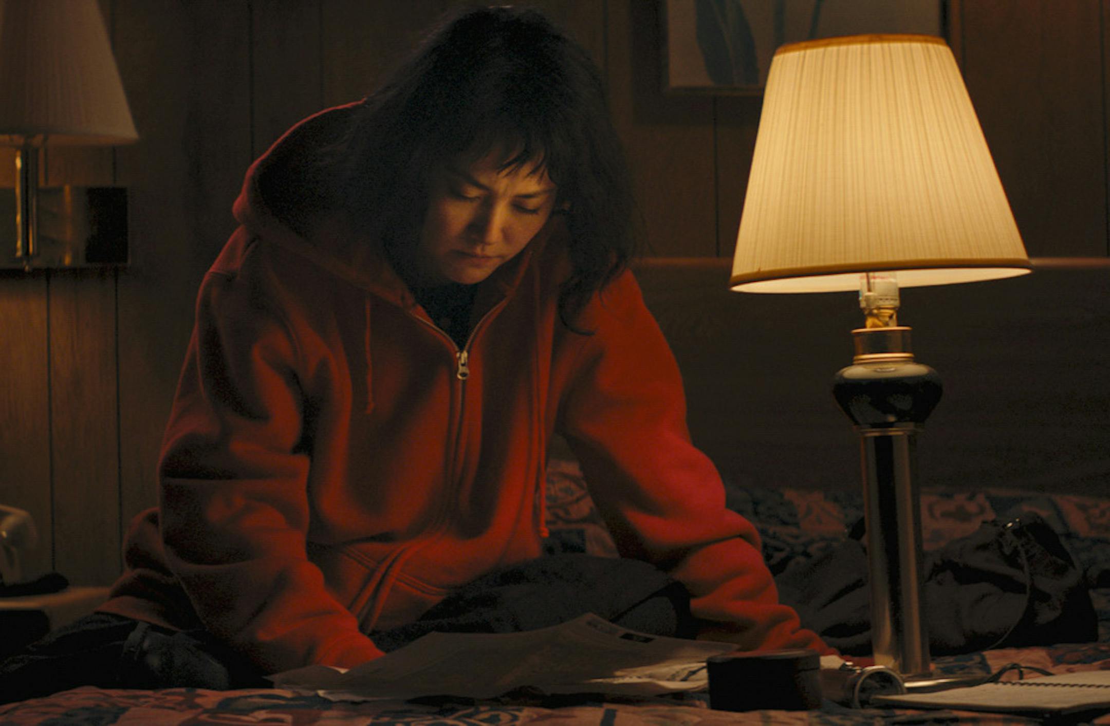In this handout photo from the Sundance Film Festival, actress Rinko Kikuchi, in the title role in the movie "Kumiko, the Treasure Hunter," looked over a map in a room in Boyd's Motel in Newport. Much of the movie was shot in Washington County.