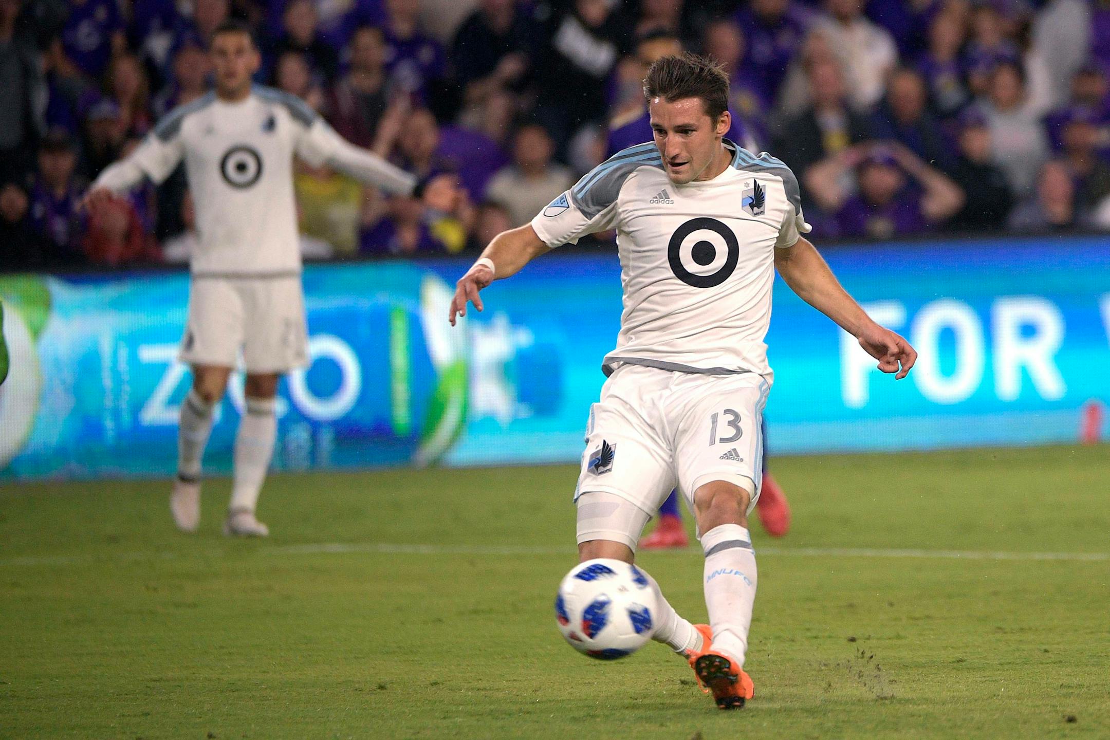 Minnesota United midfielder Ethan Finlay (13) scores a goal during the first half of an MLS soccer game against Orlando City Saturday, March 10, 2018, in Orlando, Fla. (Phelan M. Ebenhack for the Star-Tribune) ORG XMIT: OTKMINN102
