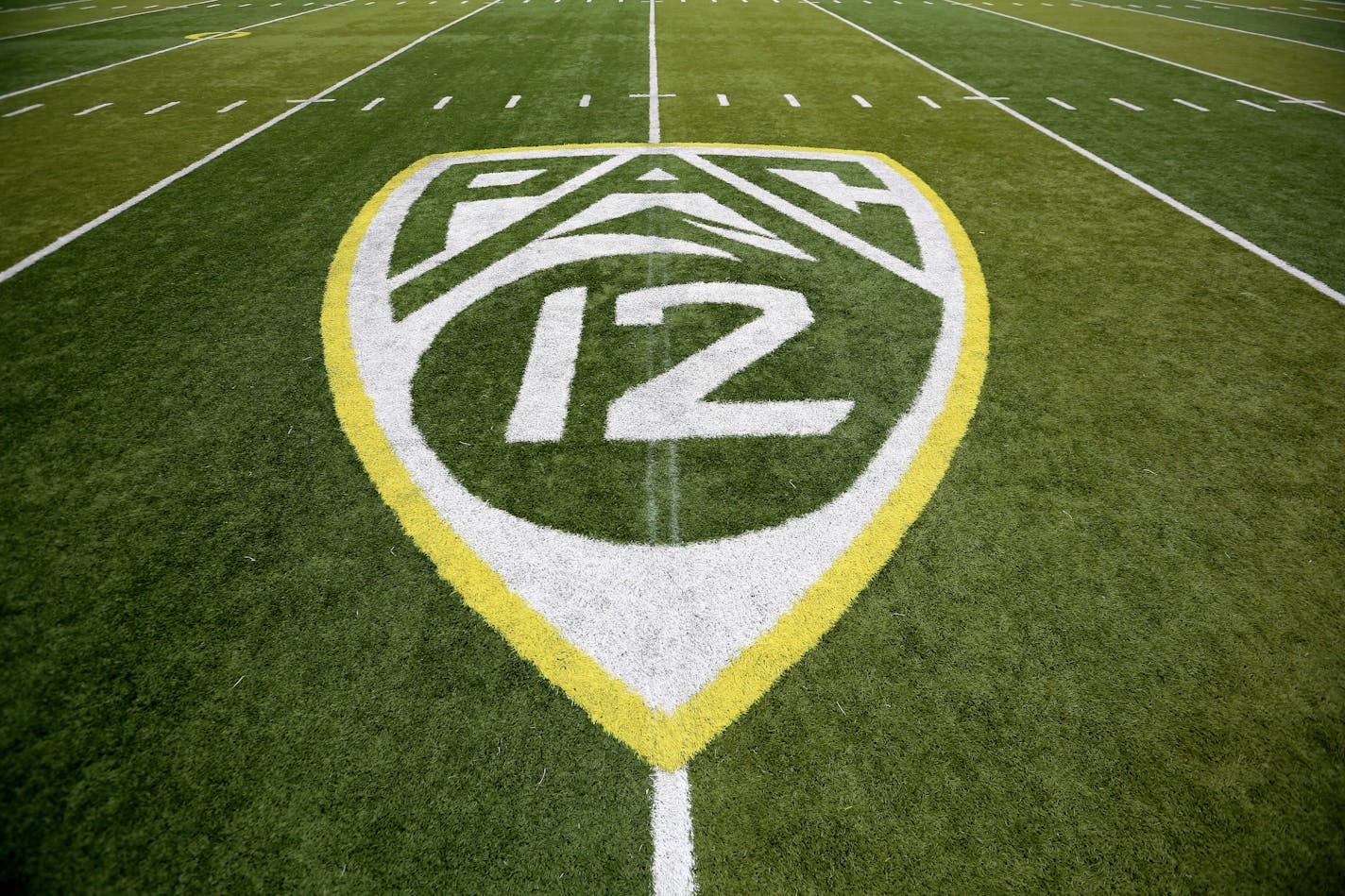 The PAC-12 logo is displayed on the field before a game between Washington State and Oregon