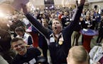 Josh Kent celebrates at Republican presidential candidate, Sen. Ted Cruz, R-Texas, caucus night rally, Monday, Feb. 1, 2016, in Des Moines, Iowa. (AP 