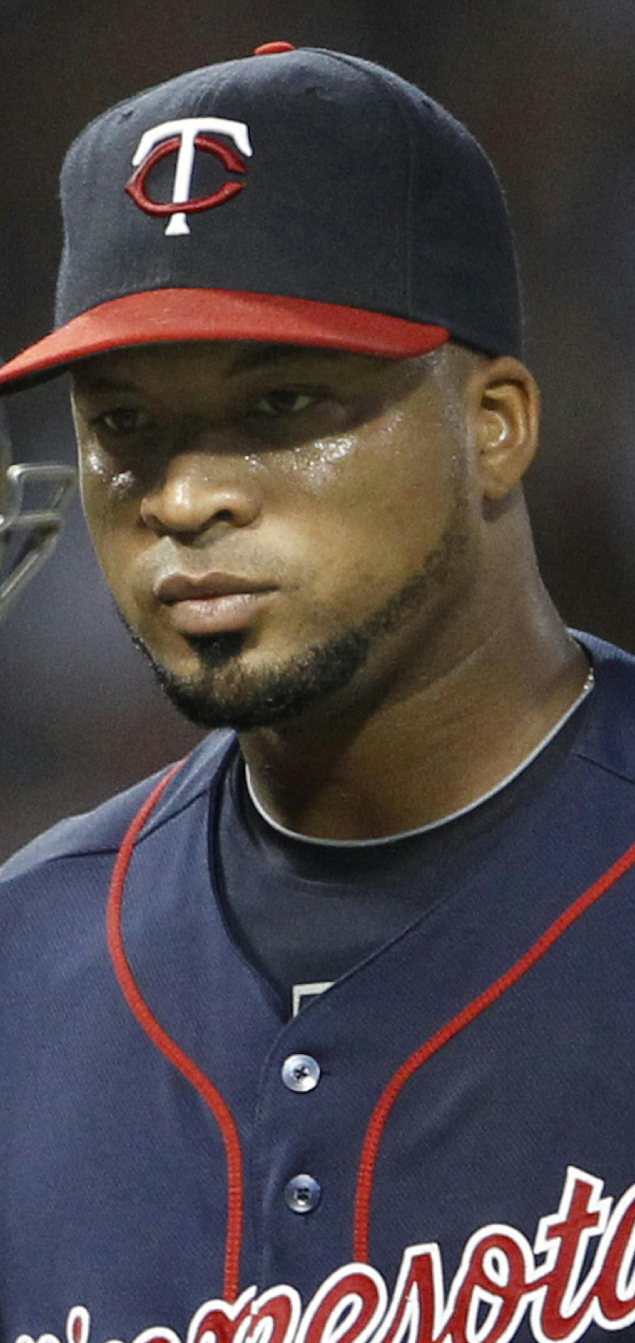 Minnesota Twins starting pitcher Francisco Liriano (47) gets pulled by Minnesota Twins manager Ron Gardenhire (35) during the third inning of their game against the Chicago White Sox at U.S. Cellular Field in Chicago, Illinois, on Monday, July 23, 2012. (Nuccio DiNuzzo/ Chicago Tribune/MCT)