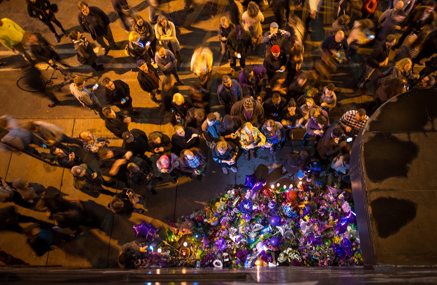 The growing memorial under Prince's star at First Avenue drew multitudes of fans.