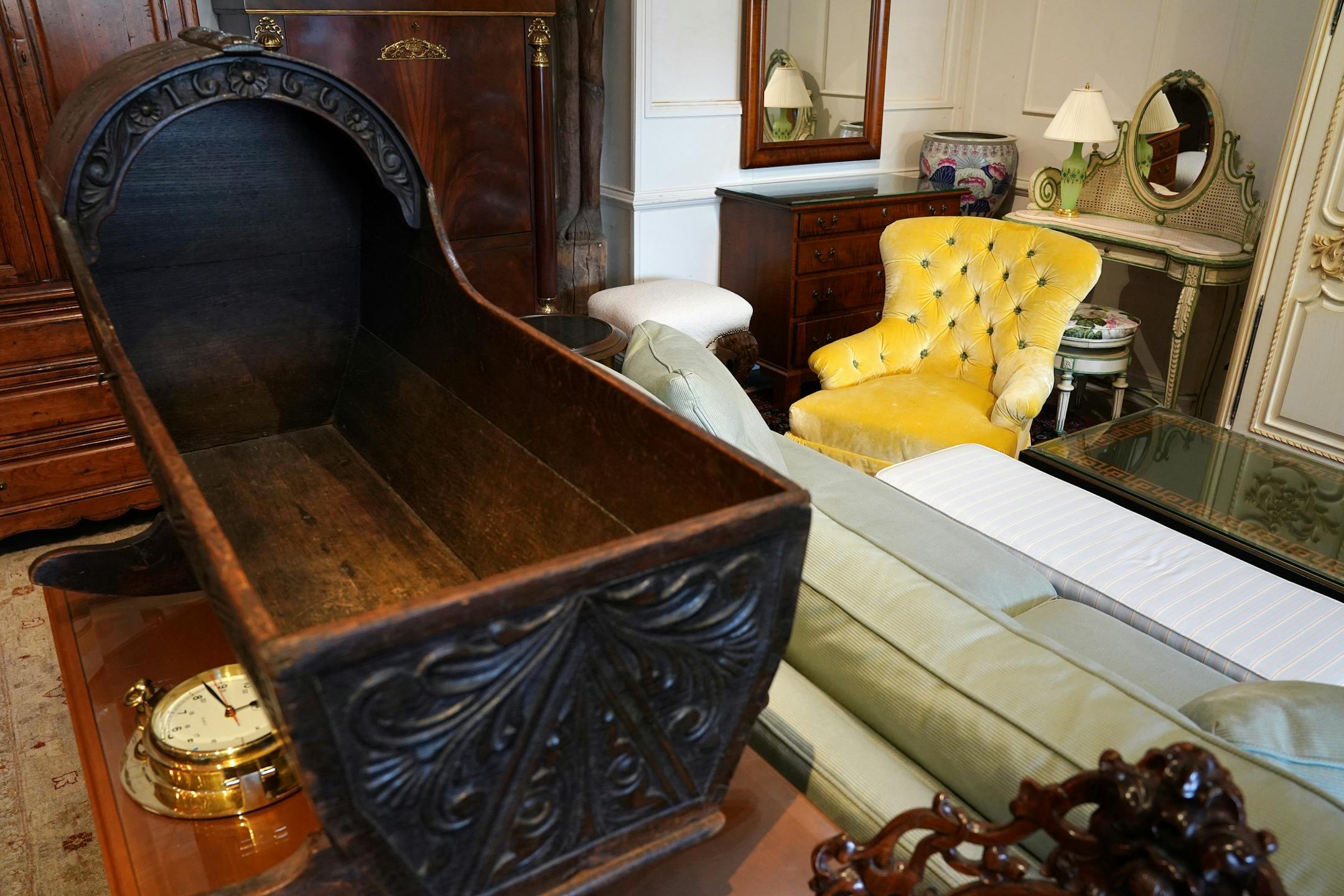 A bassinet from the Pillsbury mansion, recently demolished on Lake Minnetonka, sat with the home's other furnishings that will go up for sale this weekend at H & B Gallery.