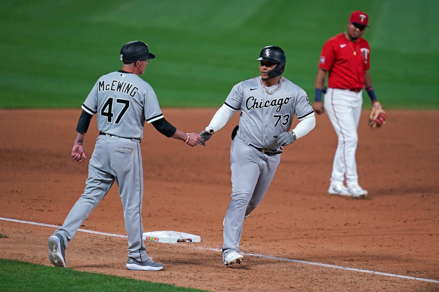 White Sox designated hitter Yermin Mercedes celebrated his home run with third base coach Joe McEwing