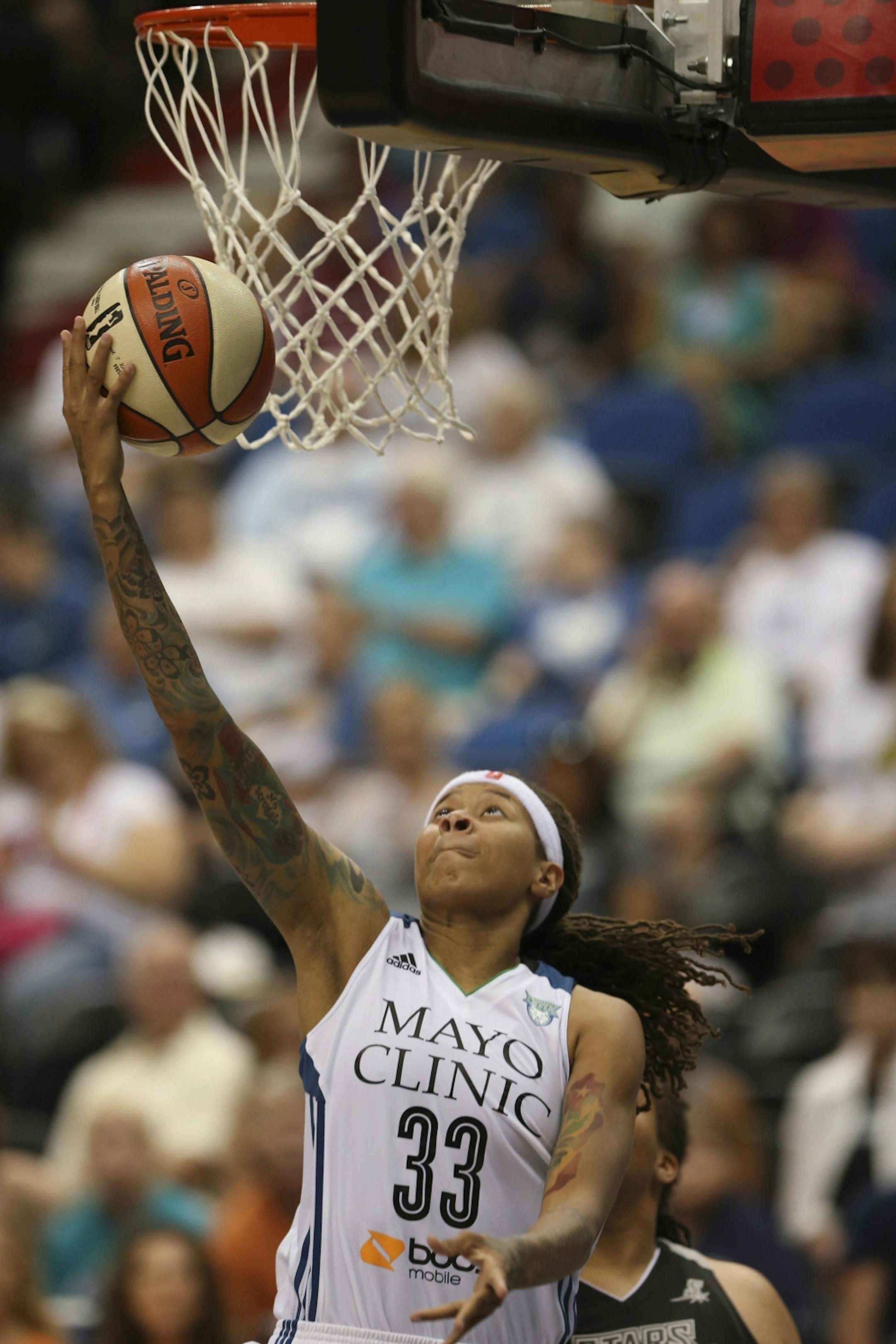 The Lynx' Seimone Augustus put up a third quarter shot Sunday night at Target Center. She finished with 12 points for the night.