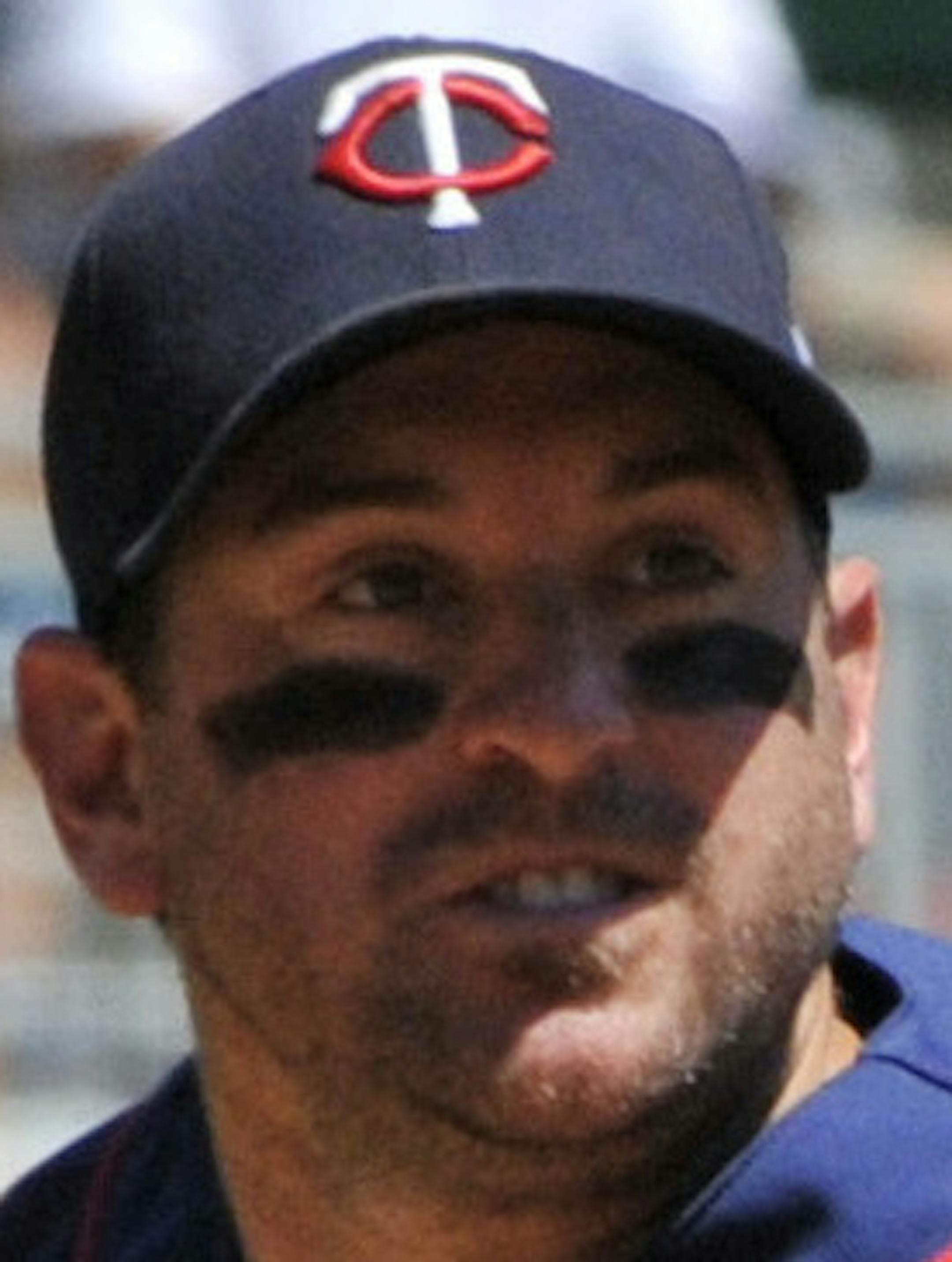 Minnesota Twins' Nick Punto against the Cleveland Indians in a major league baseball game Wednesday, July 21, 2010 in Minneapolis. (AP Photo/Jim Mone)