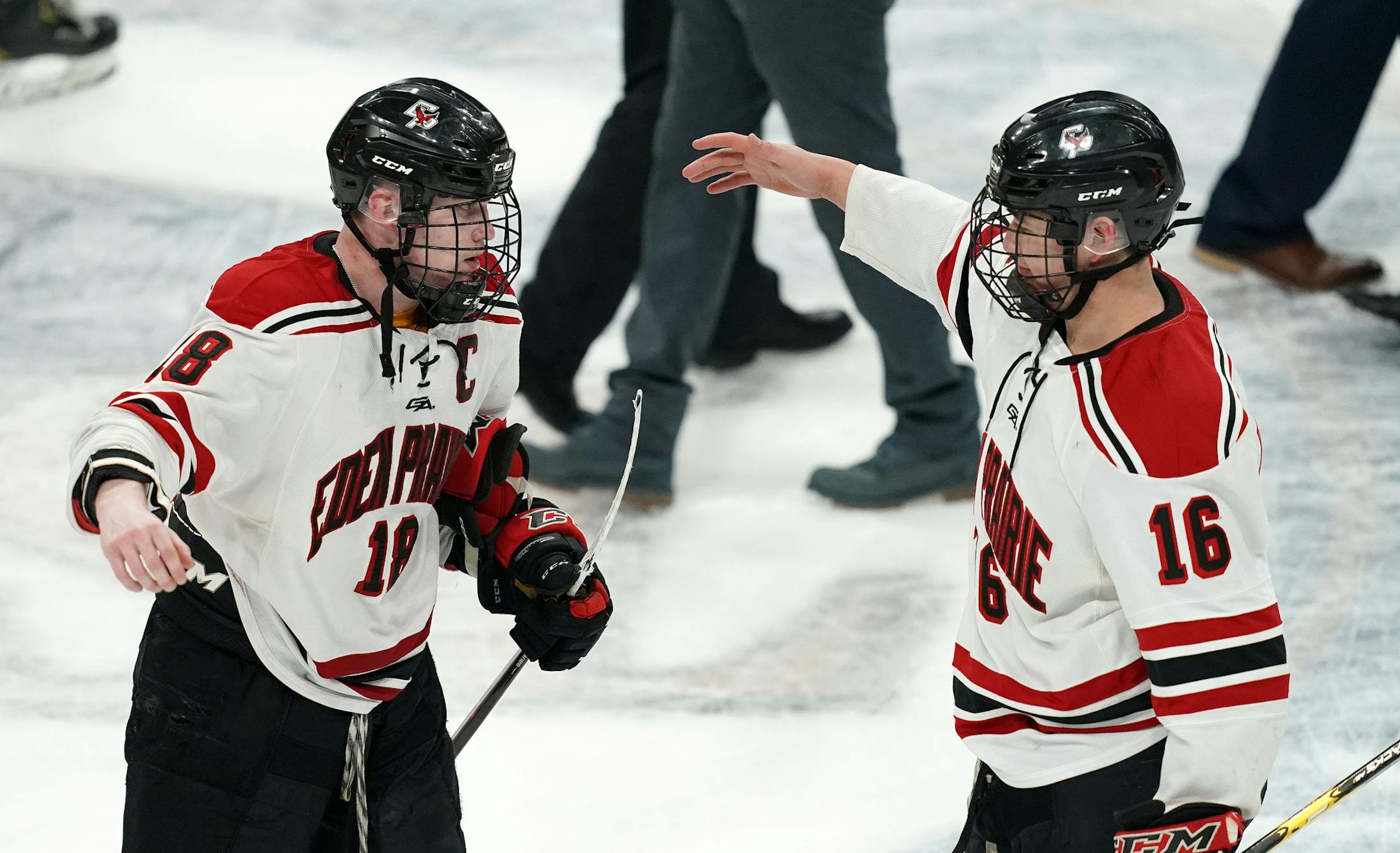 Eden Prairie forward Jack Jensen (18) celebrated with Eden Prairie defenseman Clayton Shultz (16) after scoring the game winning goal with less than a minute to play in triple overtime. ] ANTHONY SOUFFLE &#x2022; anthony.souffle@startribune.com Lakeville South High School played Eden Prairie High School in a MSHSL Class 2A boys hockey quarterfinal game Thursday, March 7, 2019 at the Xcel Energy Center in St. Paul, Minn.