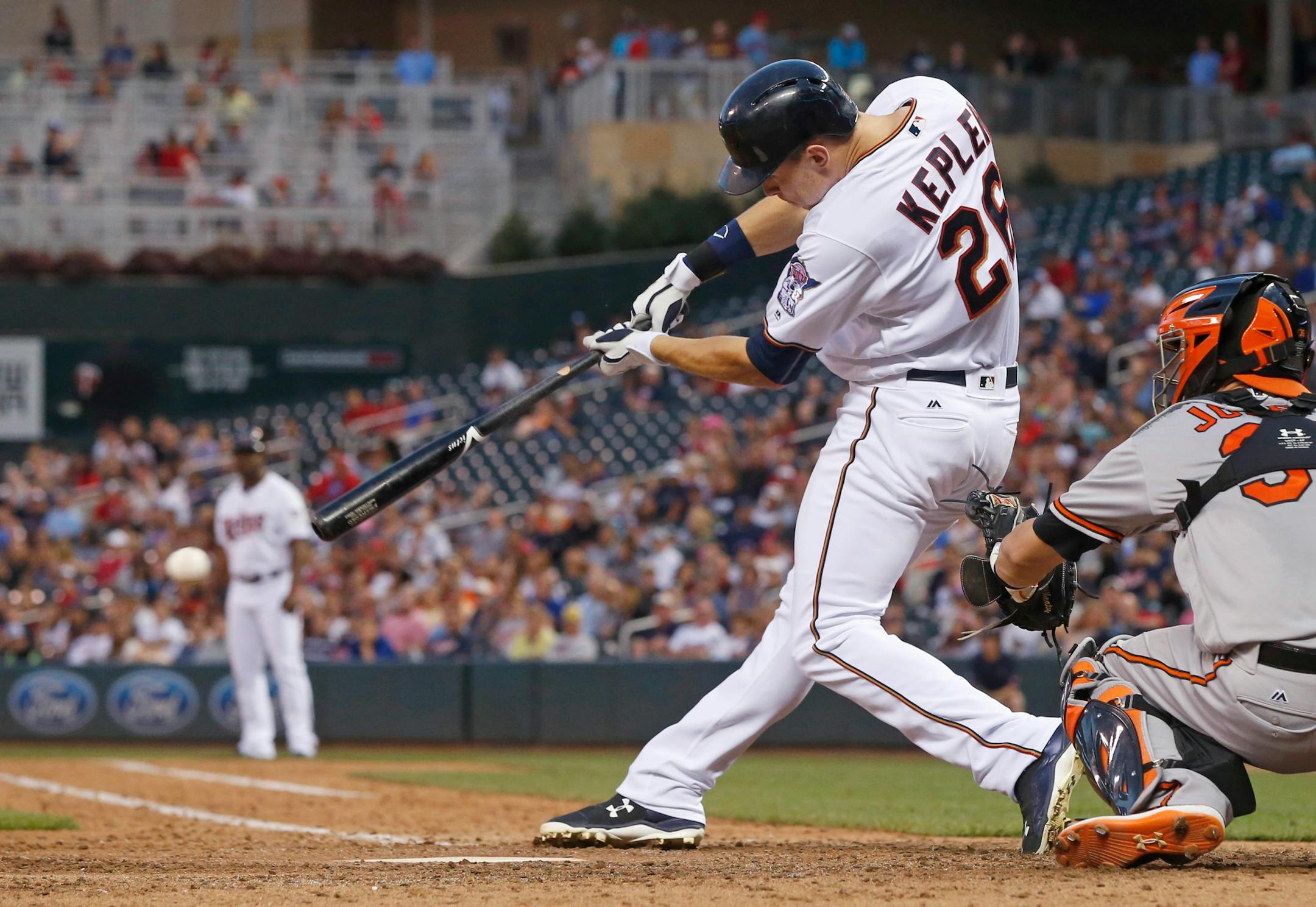Minnesota Twins' Max Kepler hits an RBI single off Baltimore Orioles pitcher Chaz Roe during the seventh inning of a baseball game Thursday, July 28, 2016, in Minneapolis. Kepler hit a solo home run in the sixth. The Twins won 6-2. (AP Photo/Jim Mone)