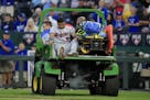 Twins third baseman Luis Arraez is taken from the game after an injury during the seventh inning of a game Saturday.