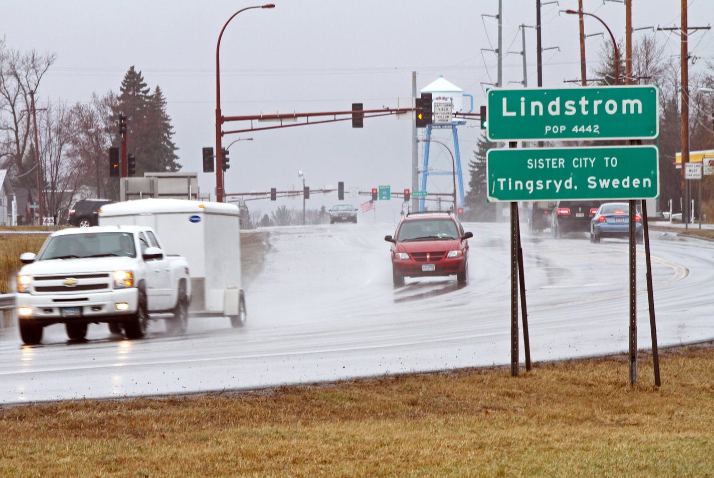 As drivers enter into Lindstrom, Minnesota city limits, they're greeted with a sign with the town's name and population. What they don't see is an umlaut over the 'o' in Lindstrom, which is visible on the town's two water towers. When printing signs, MnDOT can only use alphabetical characters, which does not include the umlaut. On the previous sign, a Lindstrom city engineer took it upon himself to cut out reflective material and adhere the umlaut to the sign. ] SHARI L. GROSS sgross@startribune