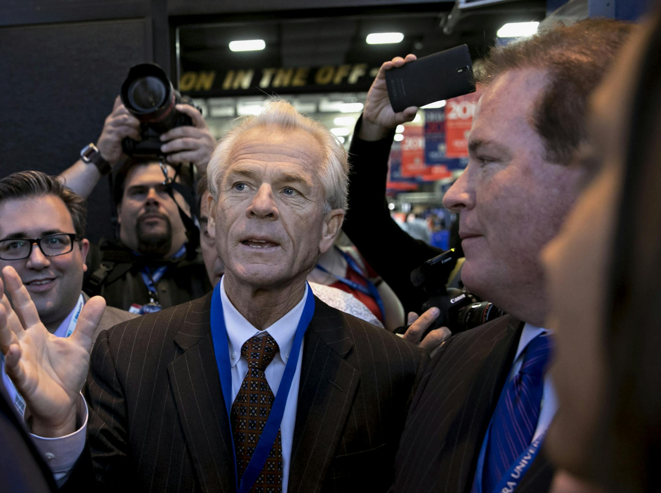 Trade advisor Peter Navarro, center, is shown Sept. 26, 2016, when he was senior economic advisor to candidate Donald Trump outside the media filing center ahead of the first U.S. presidential debate at Hofstra University in Hempstead, New York. MUST CREDIT: Andrew Harrer/Bloomberg ORG XMIT: 547173347