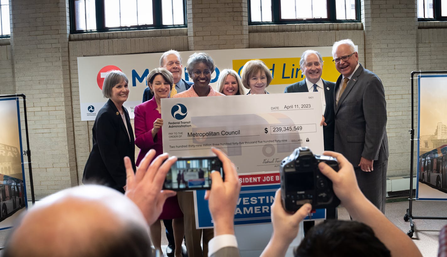 Elected officials posed with a ceremonial check for $239,345,549 for group photos Tuesday, April 11, 2023 St. Paul, Federal Transit Administrator Nuria Fernandez announced nearly $240 Million in Federal Funding for the Metro Transit Gold Line. ] GLEN STUBBE • glen.stubbe@startribune.com