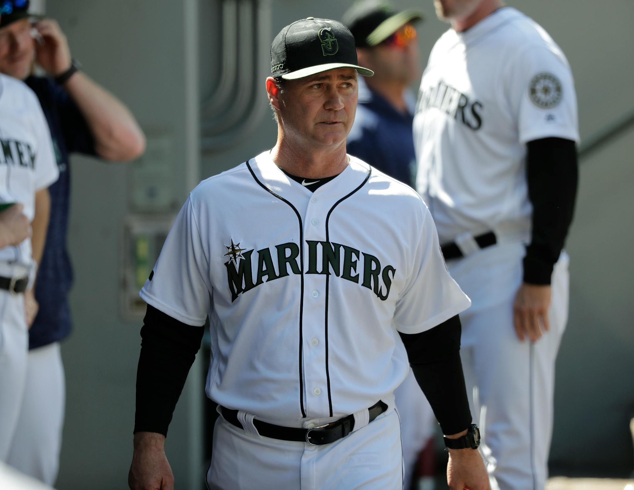 Seattle Mariners manager Scott Servais walks in the dugout during the eighth inning of a baseball game against the Minnesota Twins, Sunday, May 27, 2018, in Seattle. The Mariners won 3-1 and swept the series against the Twins. (AP Photo/Ted S. Warren)