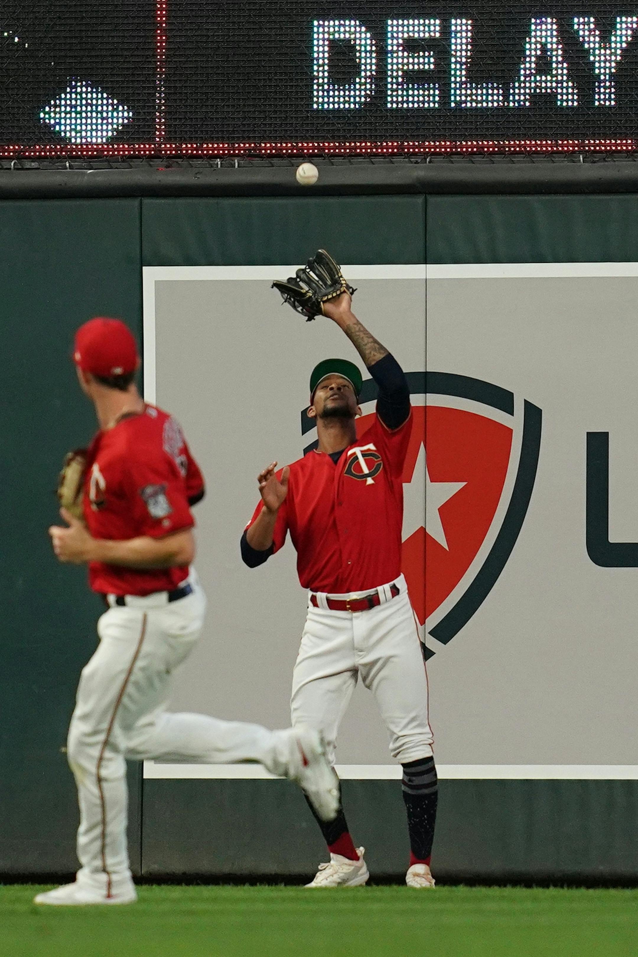 Minnesota Twins center fielder Byron Buxton (25) caught a pop fly hit by Texas Rangers second baseman Rougned Odor (12) in the second inning.