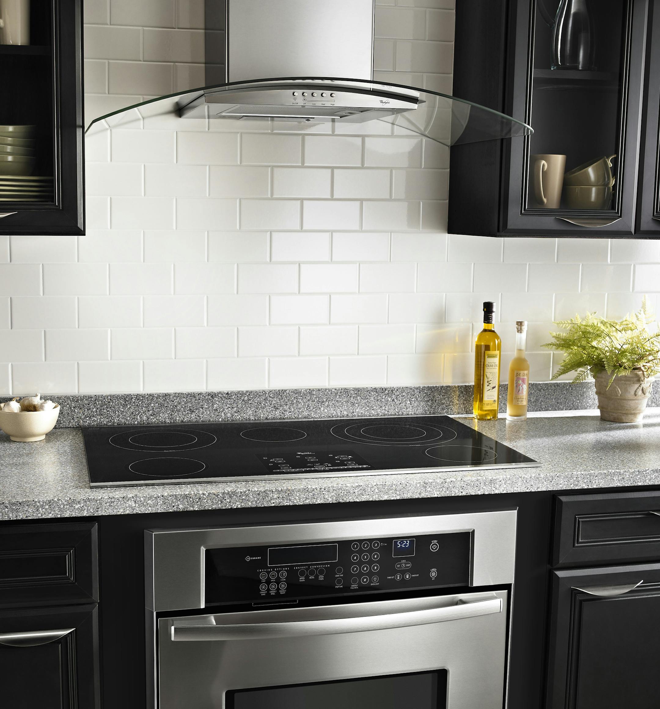 Whirlpool's 36-inch GXW6536DXS wall-mount range hood with a glass canopy is an economical option, priced at about $400 at Ferguson Bath, Kitchen & Lighting Gallery. (Courtesy of Whirlpool via Charlotte Observer/MCT) ORG XMIT: 1130910