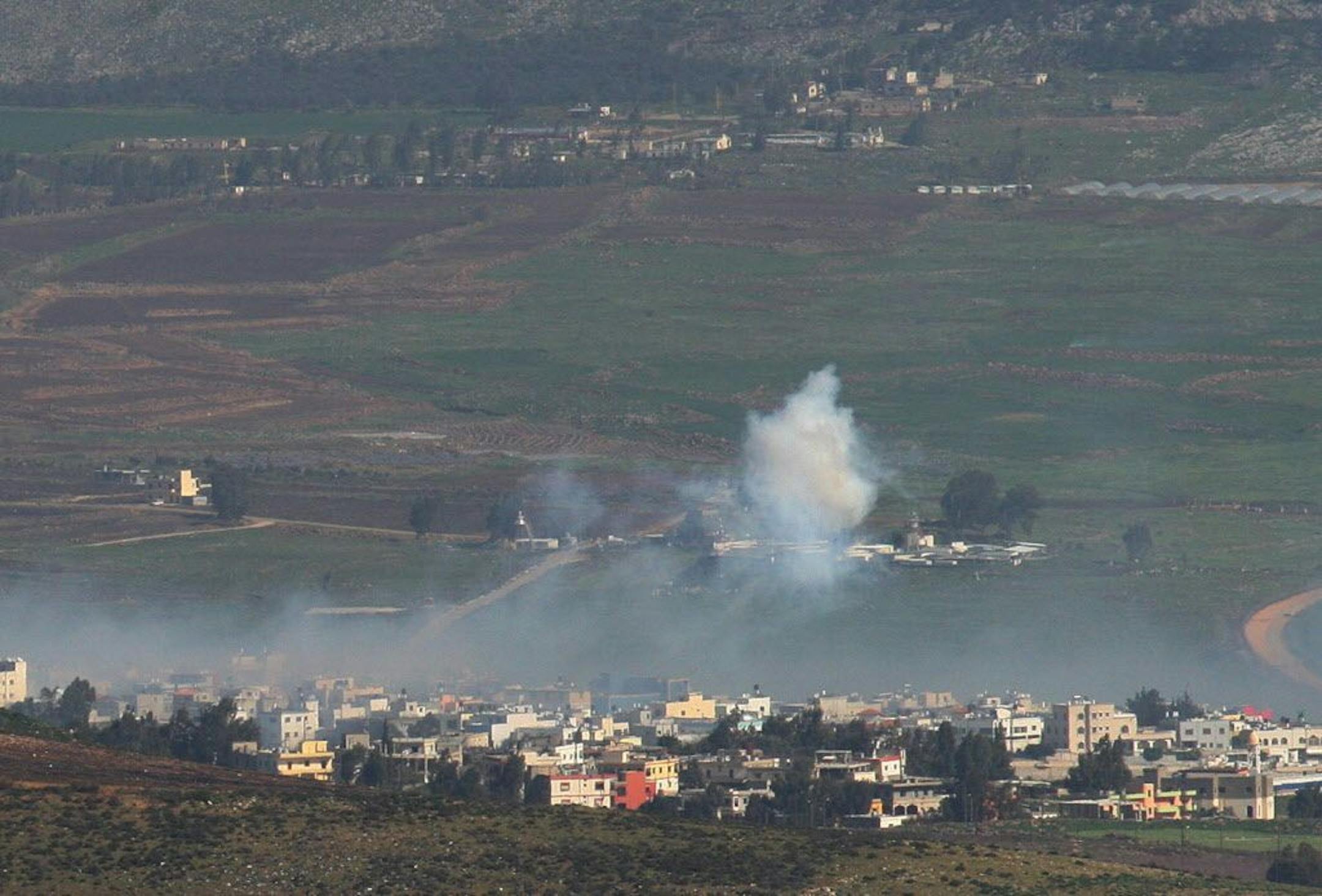Smoke rises from Israeli shelling on the edge of the Lebanese village of Abbasieh, at the Lebanese-Israeli border, south Lebanon, Wednesday, Jan. 28, 2015.