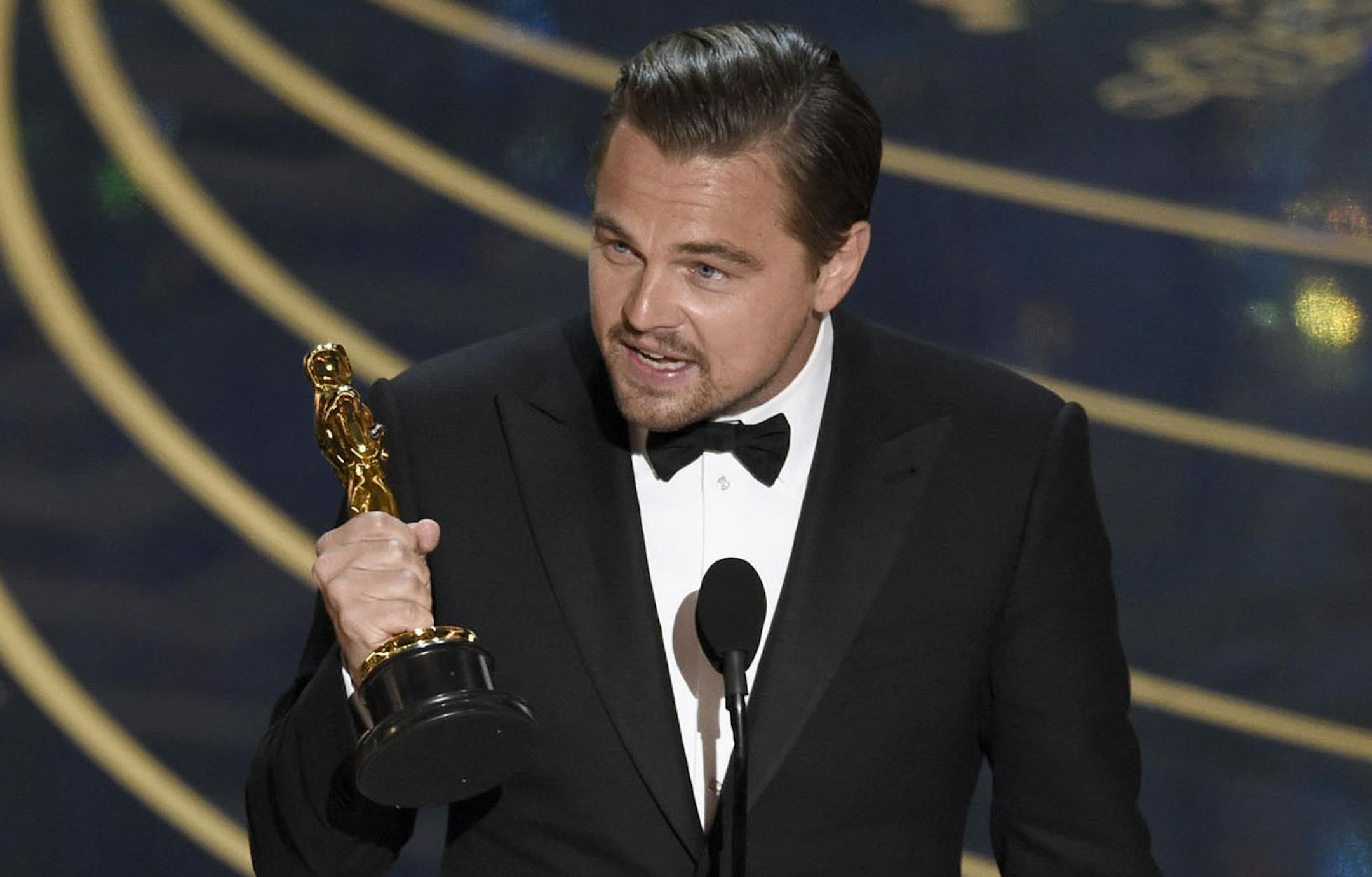 Leonardo DiCaprio accepts the award for best actor in a leading role for ìThe Revenantî at the Oscars on Sunday, Feb. 28, 2016, at the Dolby Theatre in Los Angeles. (Photo by Chris Pizzello/Invision/AP) ORG XMIT: MIN2016022823073427