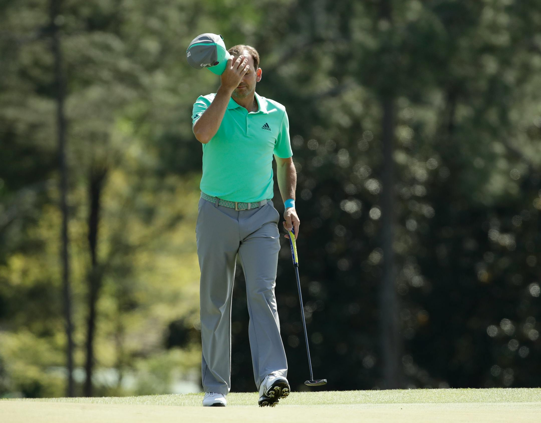 Sergio Garcia put five balls into the water before he finished the 15th hole Thursday.