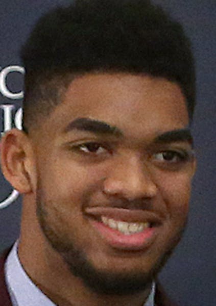 Timberwolves draft picks Karl-Anthony Towns (left, first overall in the NBA Draft) and Tyus Jones were introduced during a news conference Friday afte