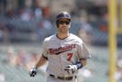 Minnesota Twins' Joe Mauer heads home after his solo home run during the first inning of a baseball game against the Detroit Tigers, Wednesday, July 2