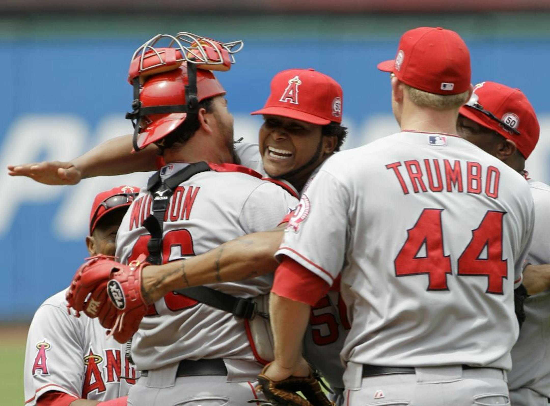 Ervin Santana hugged catcher Bobby Wilson after last week's no-hitter