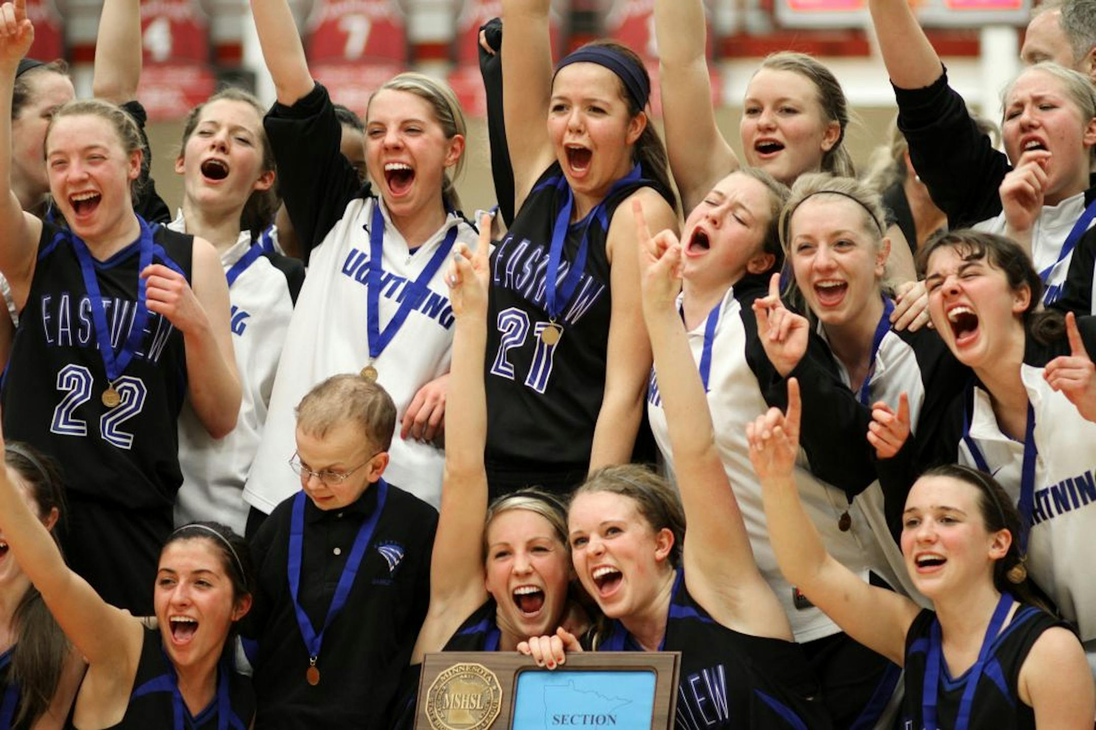 Eastview celebrated their section finals victory March 8 over Park of Cottage Grove.