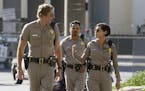 This image released by Warner Bros. Pictures shows Dax Shepard, from left, Michael Pena and Rosa Salazar in a scene from, "CHiPS." (Warner Bros via AP