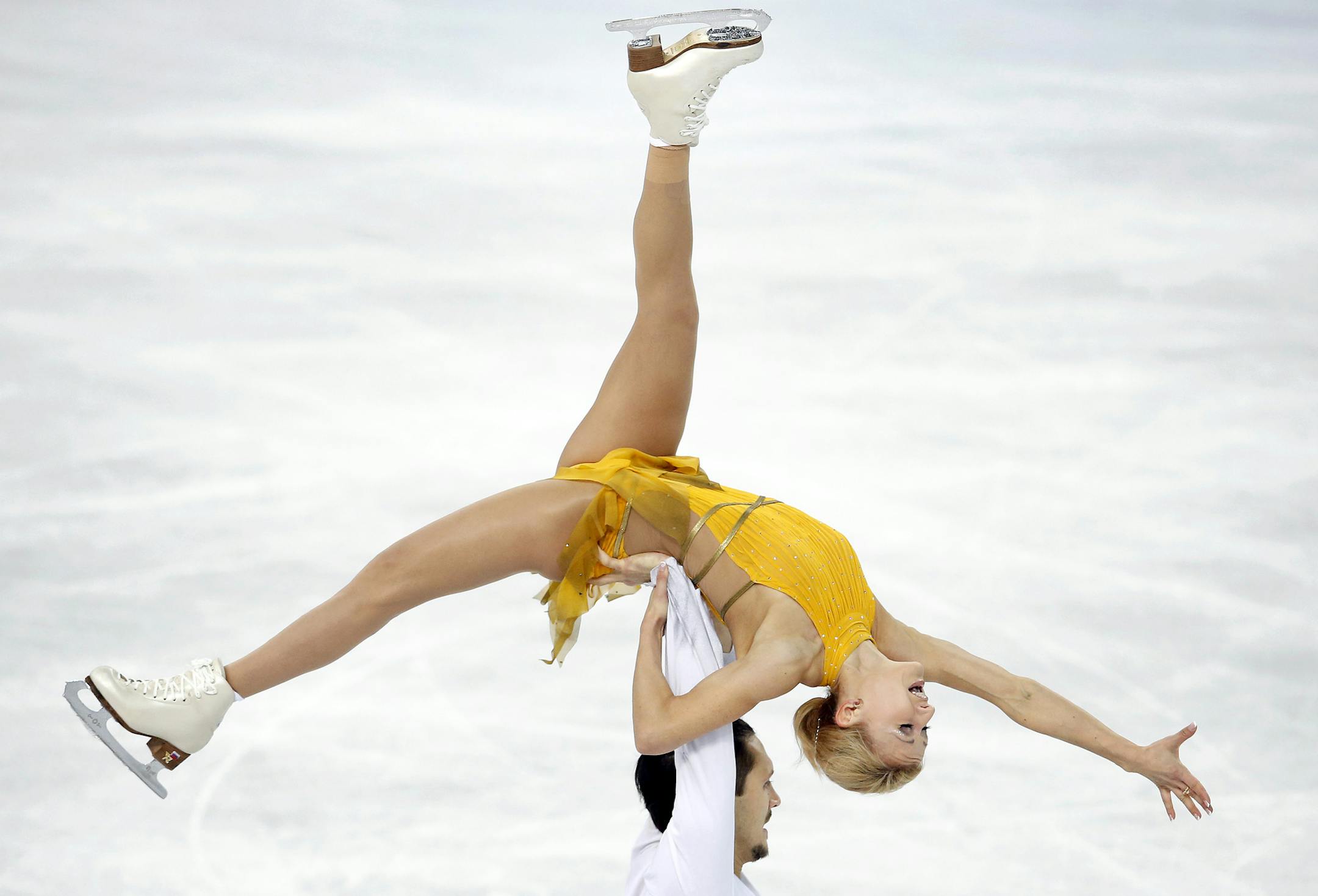 Russia's Tatiana Volosozhar and Maxim Trankov performed during the pairs free program. Russia's Tatiana Volosozhar and Maxim Trankov won the gold medal with a score of 236.86, while Russia's Ksenia Stolbova and Fedor Klimov took the silver with a score of 218.68. The bronze medal went to Germany's Aliona Savchenko and Robin Szolokowy (215.78). ] CARLOS GONZALEZ cgonzalez@startribune.com - February 12, 2013, Sochi, Russia, Sochi 2014 Winter Olympics, Iceberg Skating Palace, pairs free skate