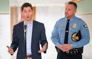 Minneapolis Mayor Jacob Frey, left, and Minneapolis Police Chief Brian O'Hara announced an agreement over funding police retention and recruitment inc