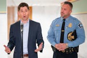 Minneapolis Mayor Jacob Frey, left, and Minneapolis Police Chief Brian O'Hara announced an agreement over funding police retention and recruitment inc