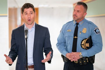 Minneapolis Mayor Jacob Frey, left, and Minneapolis Police Chief Brian O'Hara announced an agreement over funding police retention and recruitment inc