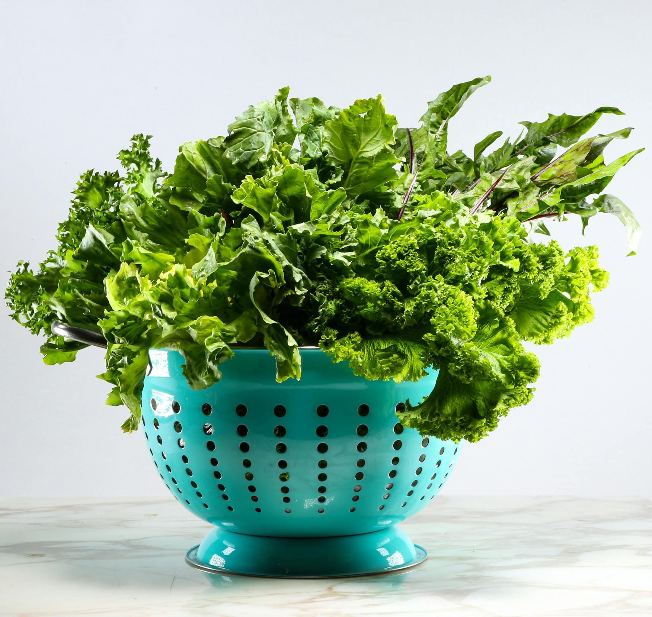 A bounty of bitter vegetables includes asparagus and mustard greens.