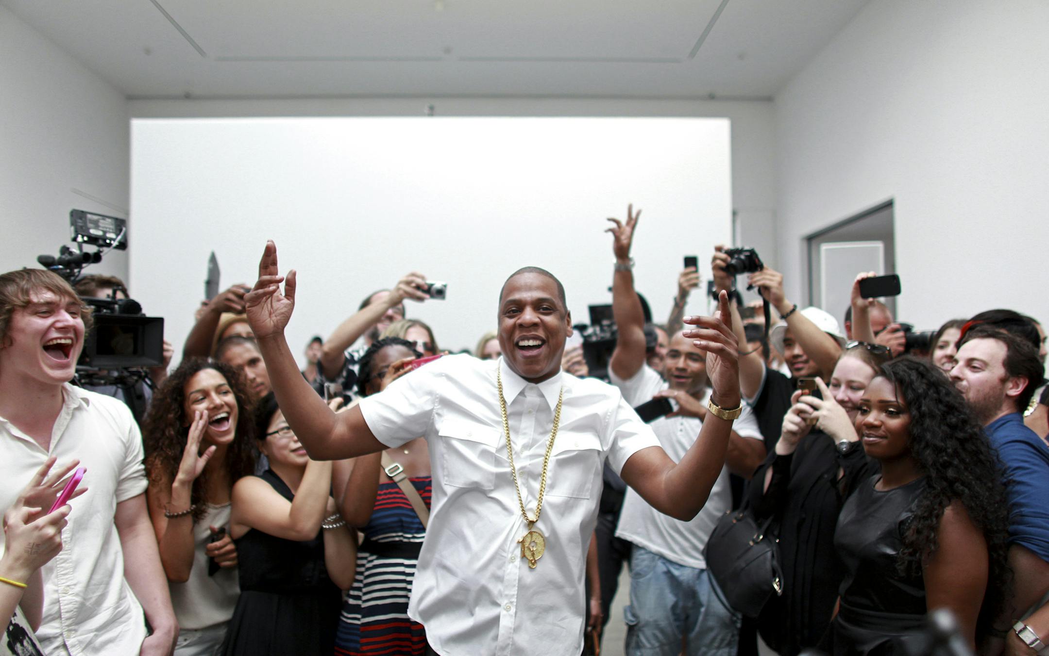 Hip-hop mogul Jay-Z performs "Picasso Baby" during the taping of its music video at the Pace Gallery in New York, July 10, 2013. Hundreds of fans and art-world types were invited to take part in a live filming of the rapper's music video for √íPicasso Baby,√ì the art-centric song off his new album, √íMagna Carta √âHoly Grail.√ì (Yana Paskova/The New York Times) -- PHOTO MOVED IN ADVANCE AND NOT FOR USE - ONLINE OR IN PRINT - BEFORE JULY