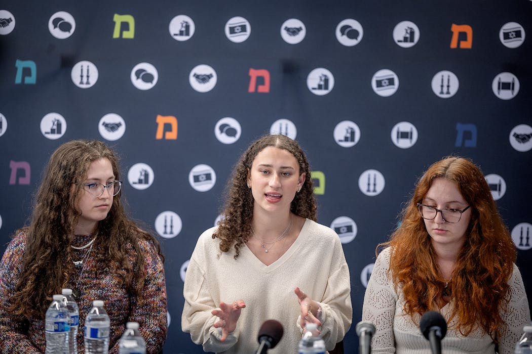 From left: University of Minnesota students Izzy Lundquist, Halle Wasserman and Alex Stewart address the media at the Minnesota Hillel on Thursday. 