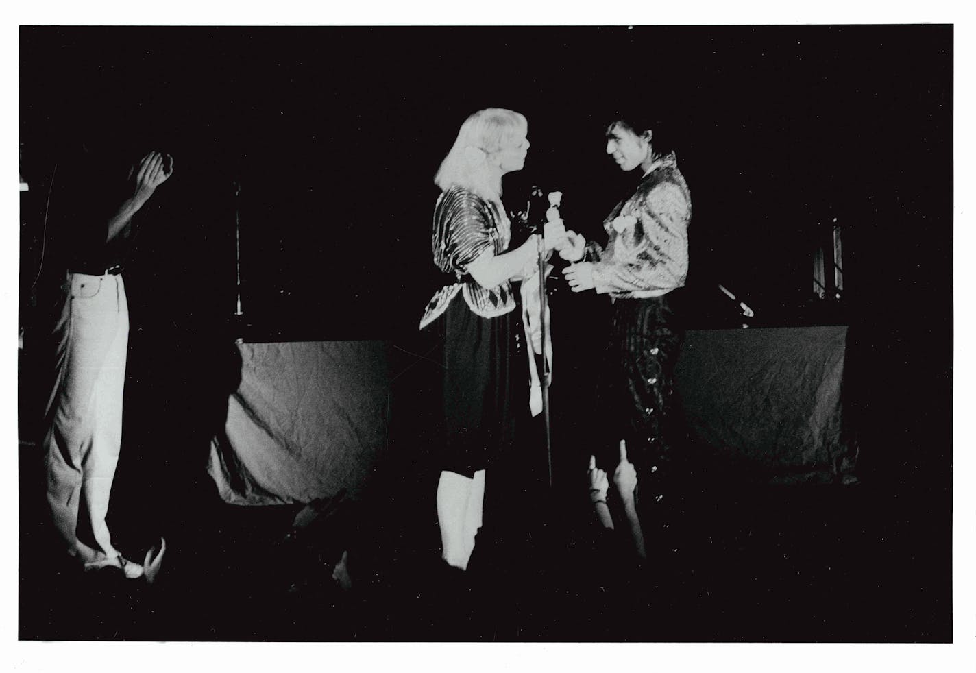 Minnesota Dance Theatre founder Loyce Houlton with Prince at the MDT benefit Aug. 3, 1983 at First Avenue. She later wrote of that moment: "Prince came out to sing several encores. Then the high-flying evening was coming to an end. My staff had 'choreographed' that I should go on stage and present Prince with a single purple rose. They told me to say nothing. But when Prince came back to the stage, I stepped up to the microphone and said 'He's not a Prince -- he's a King.' And then Prince ran to