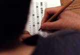 In this March 12, 1999 file photograph, a student fills in his answer to the practice test question for a standardized test, in Roswell, Georgia.