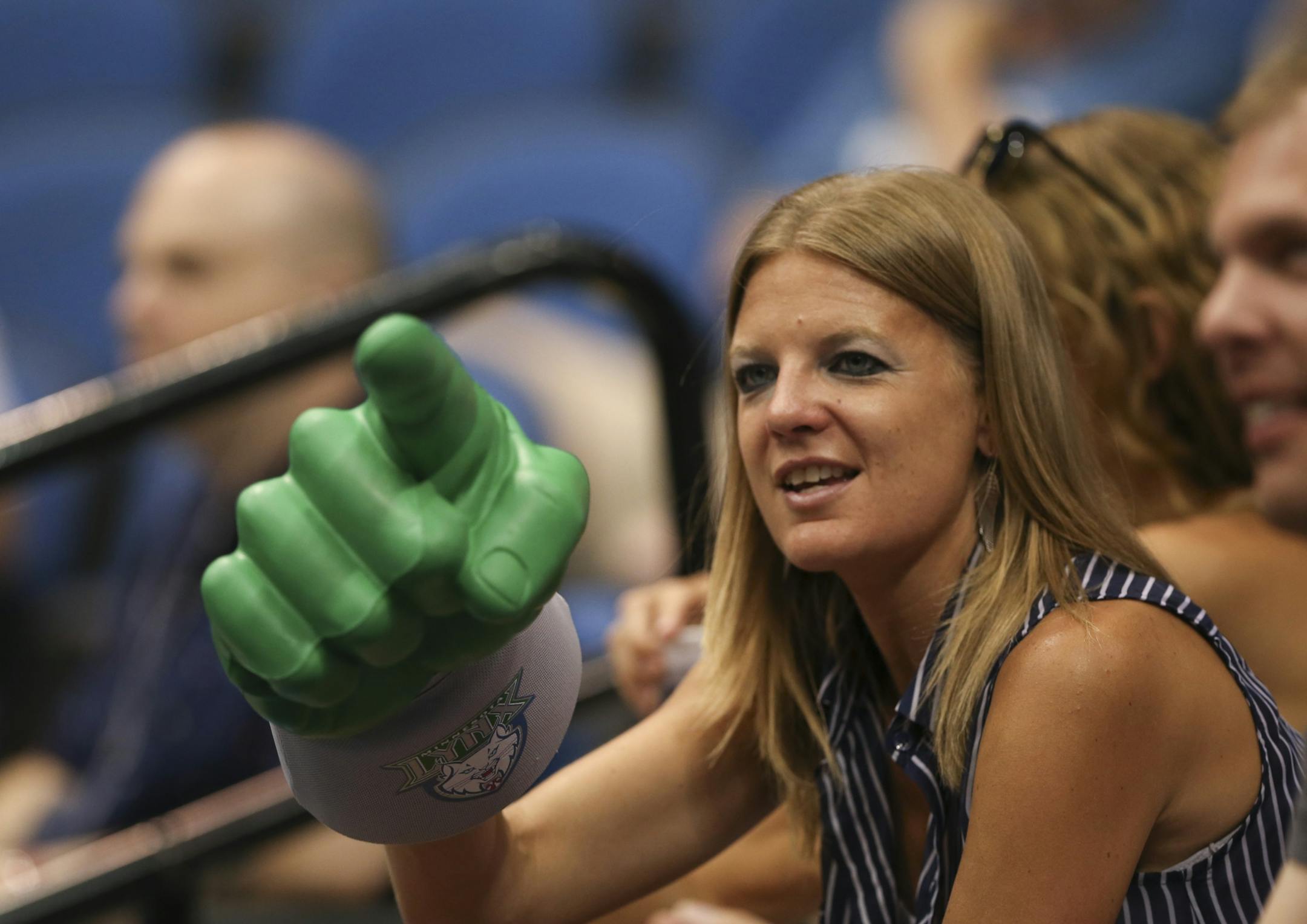 A Lynx fan with a giant foam hand made her point Sunday night at Target Center.