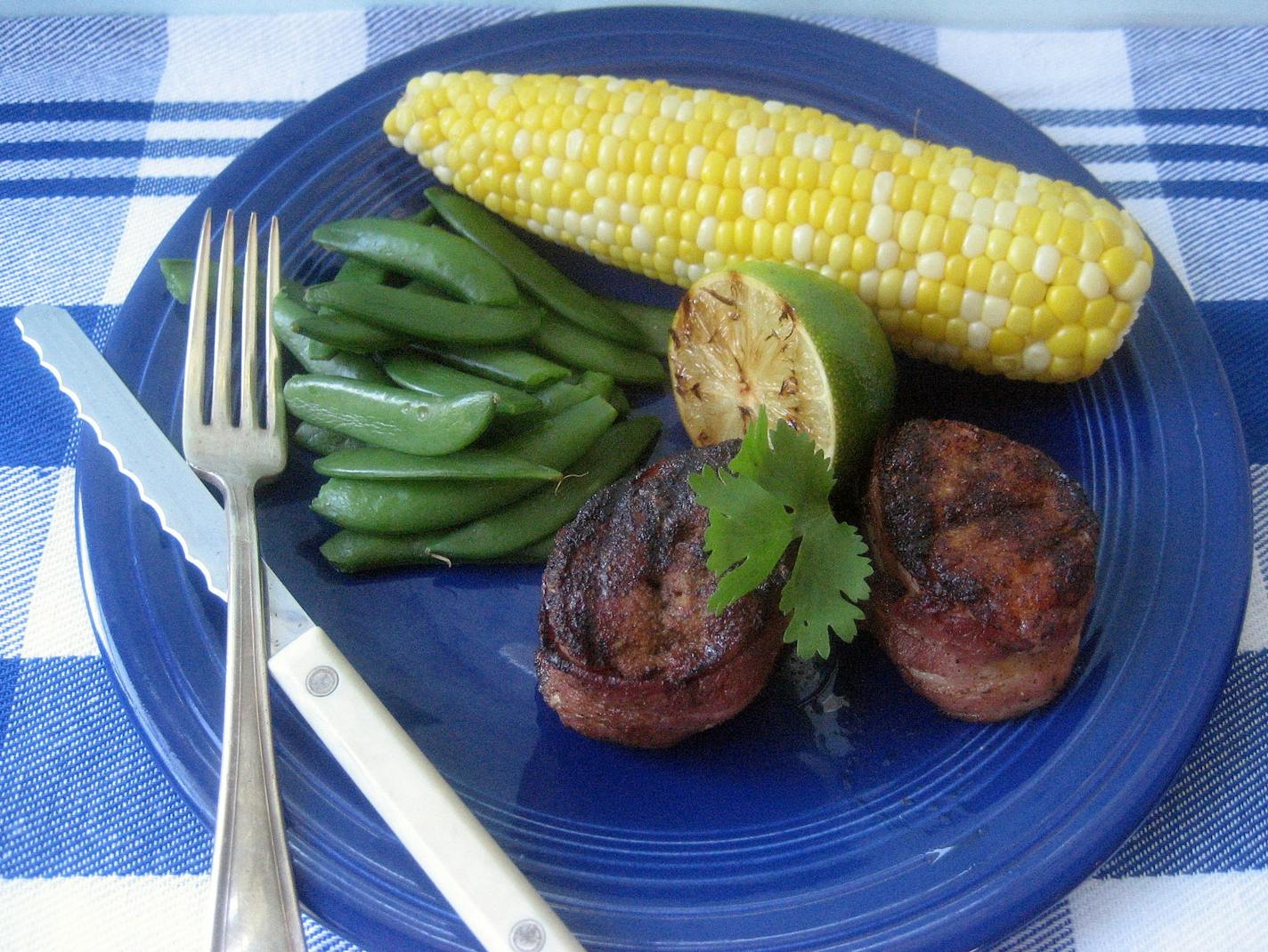 Chili-Rubbed Turkey 'Tenderloins' with Grilled Limes.