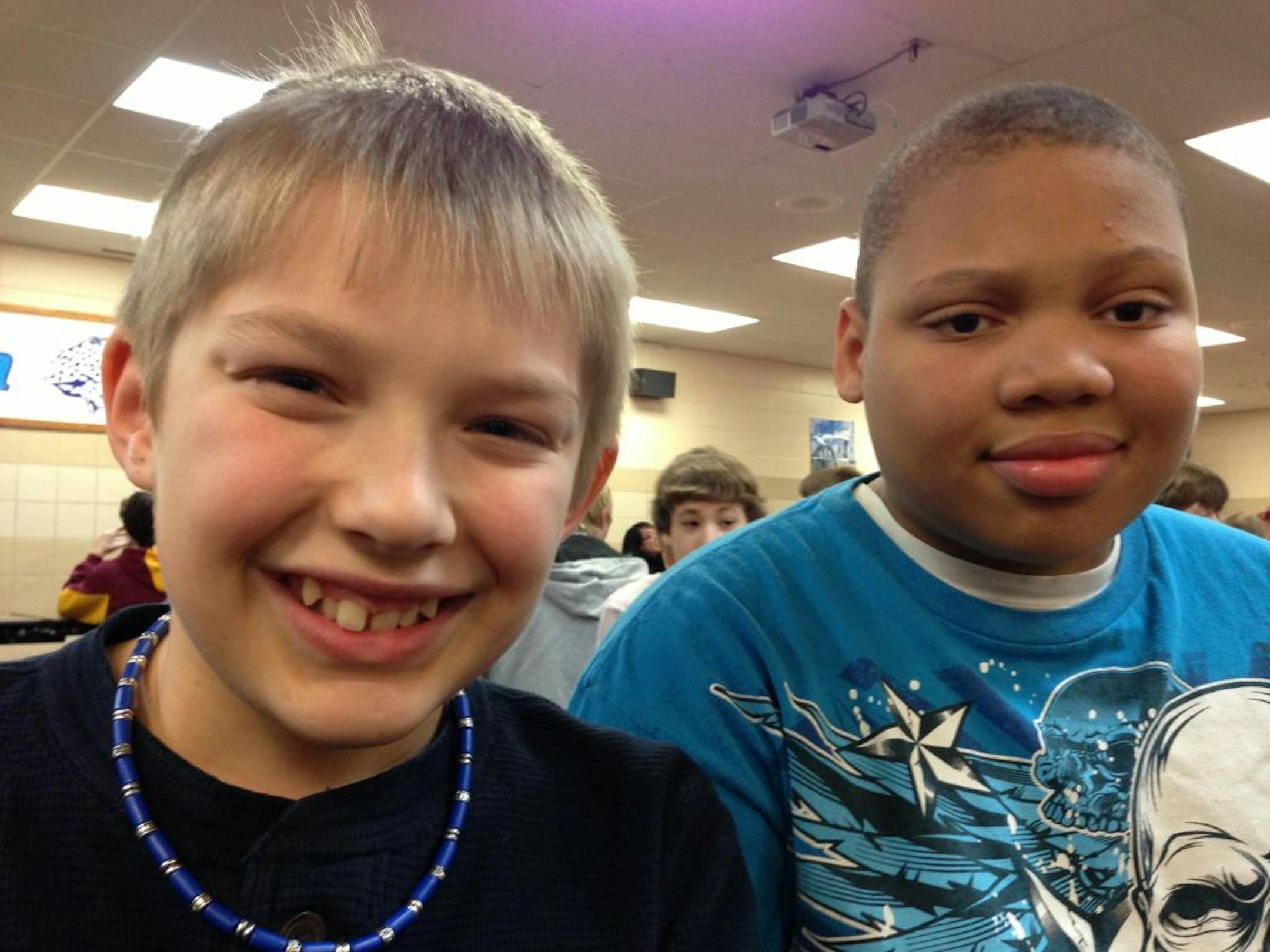 Seventh-graders Malachi Franz, left, and Aaron Magness revisited the Jackson Middle School cafeteria where Aaron saved his friend's life a few weeks ago.