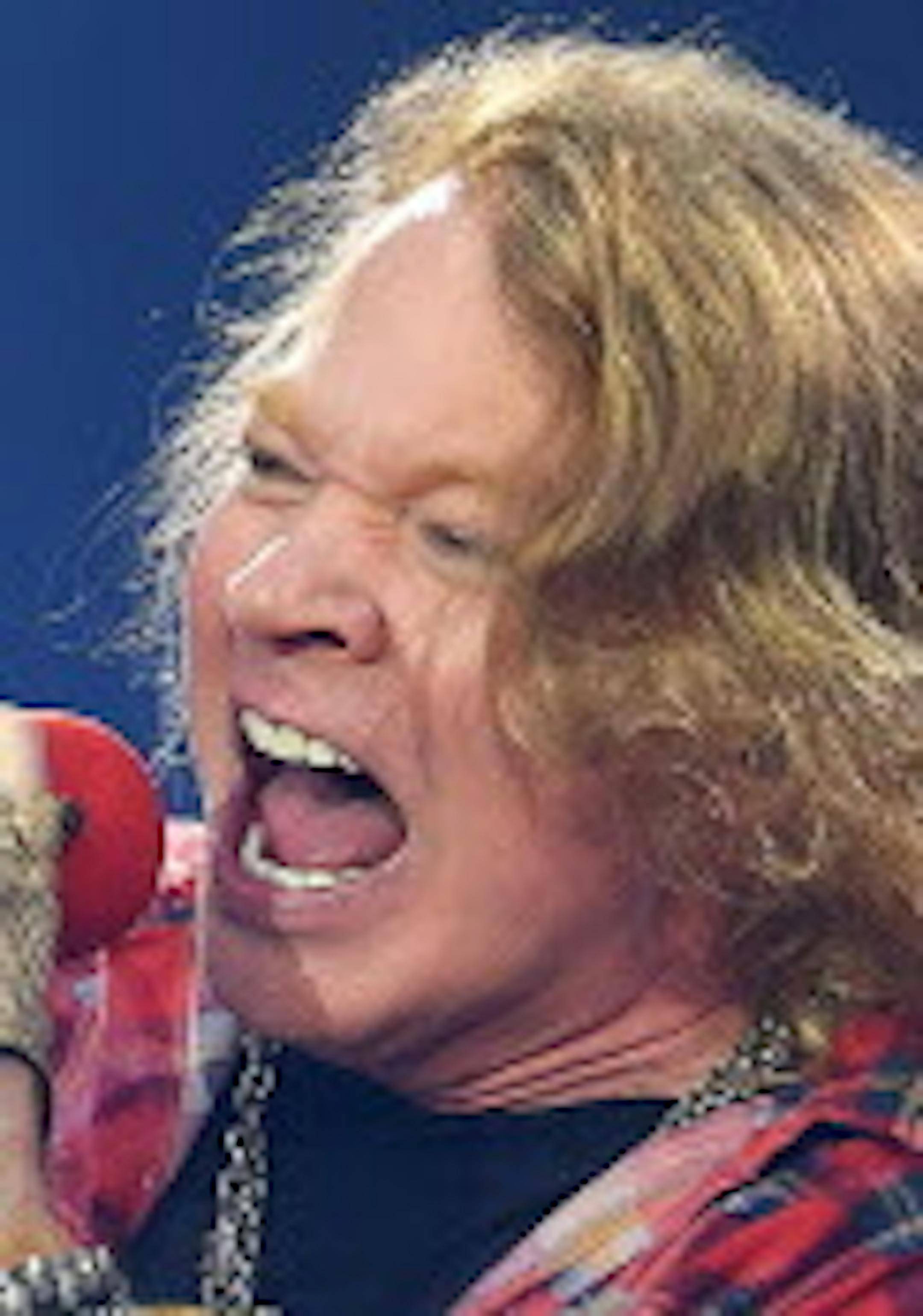 Axl Rose of the band AC/DC performs at the Olympic Stadium in London, Saturday, June 4, 2016. (Photo by Mark Allan/Invision/AP)-