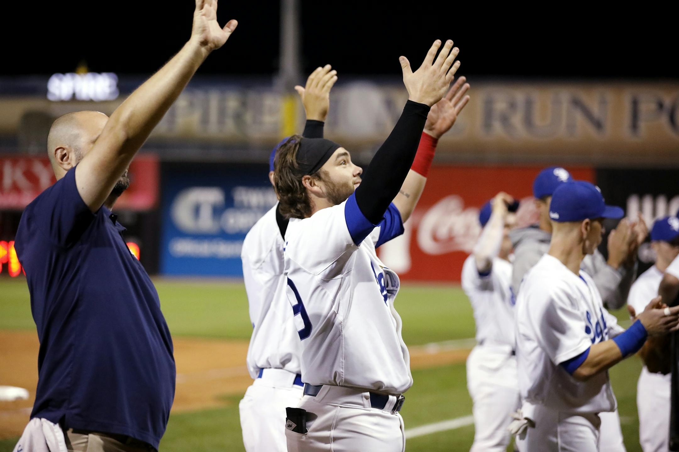 Dante Bichette Jr. and other Saints players thank the crowd at the end of the game, the last home game of the season.