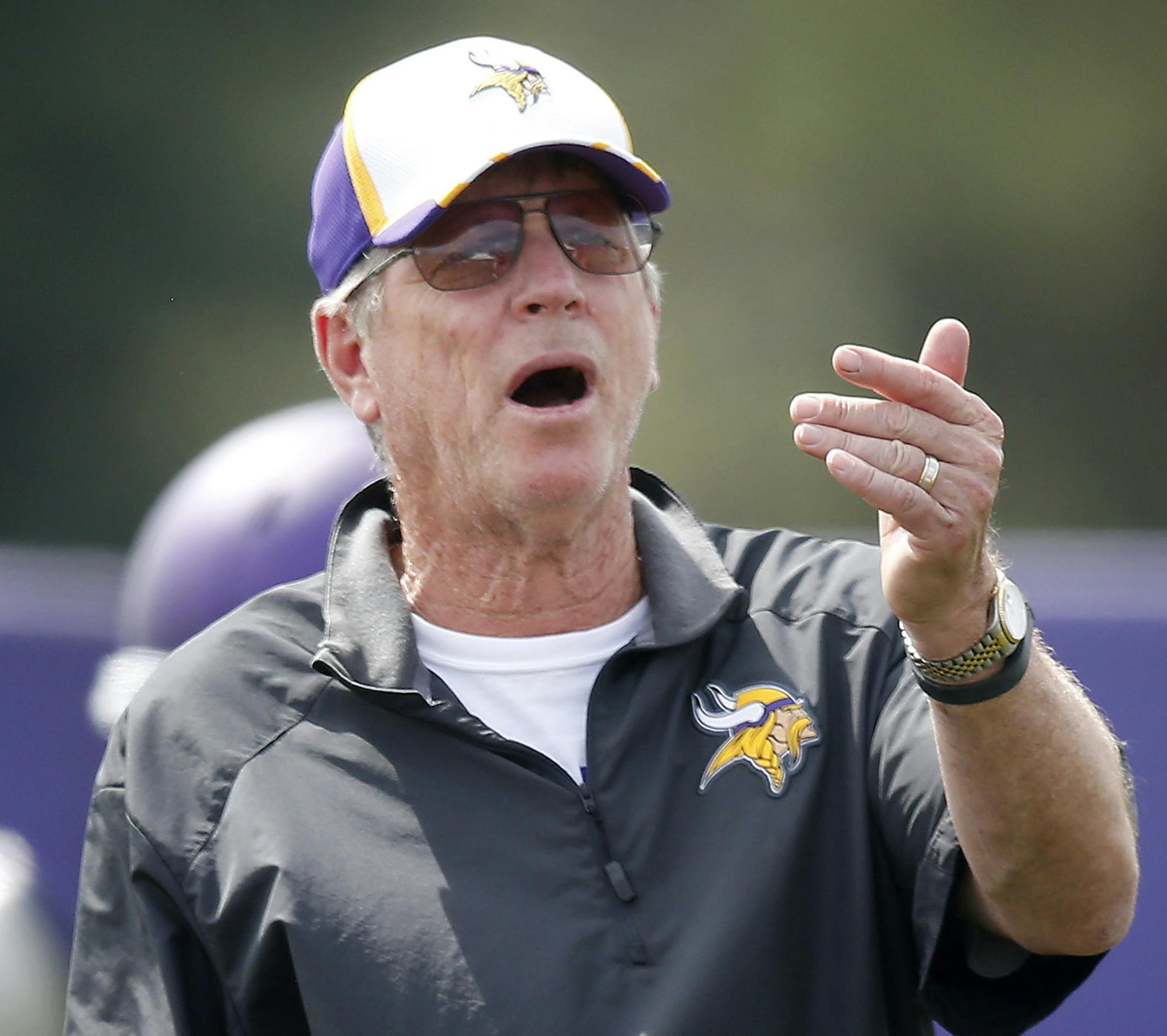 Minnesota Vikings offensive coordinator Norv Turner and quarterback Teddy Bridgewater (5) during the afternoon practice on Tuesday. ] CARLOS GONZALEZ cgonzalez@startribune.com - August 5, 2014 , Mankato, Minn., Minnesota State University, Mankato, Minnesota Vikings Training Camp, NFL,