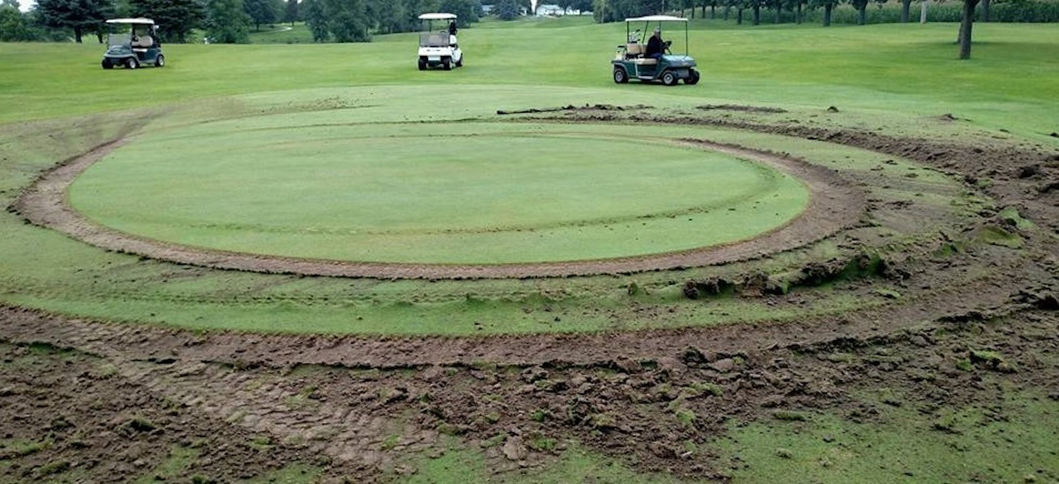 Someone did ìdoughnutsî on the first green at a golf course in Wheaton, Minn. ORG XMIT: NzOmGdBmCgwWMhd6sGhZ