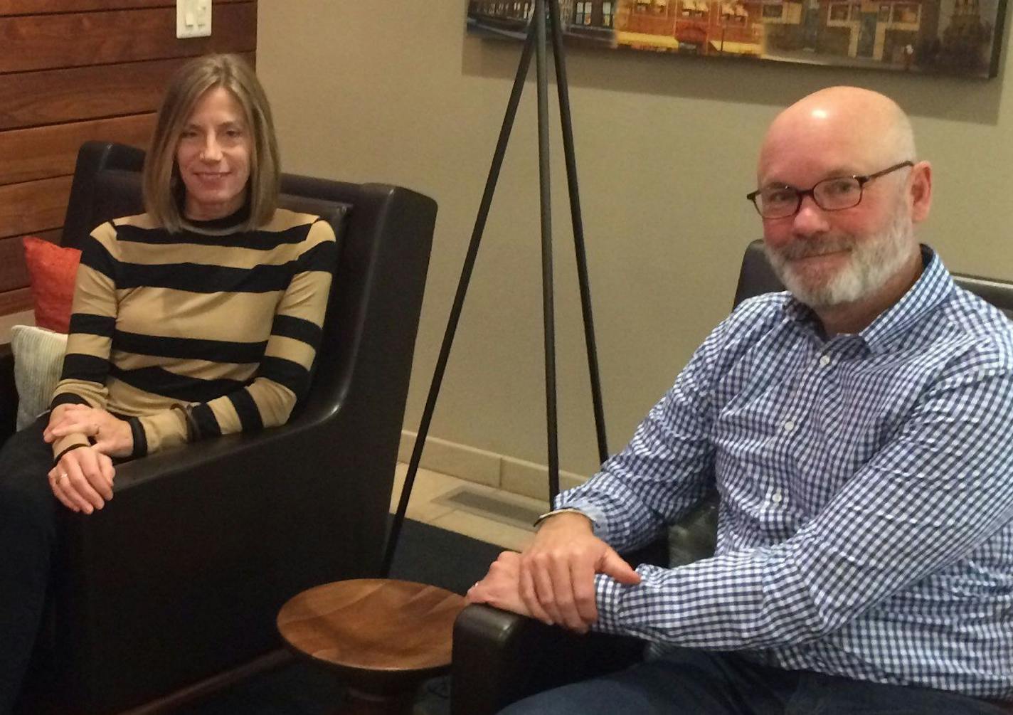 Kathy and Eric Gibson in the lobby of Mill & Main, their apartment in Minneapolis